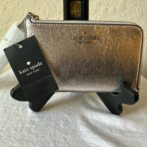 Kate Spade: Small Lucy leather zip wristlet- Silver Tone- metallic silver